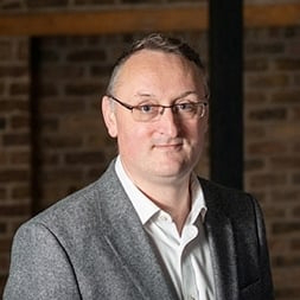 John Maguire (CEO of TripAdmit)